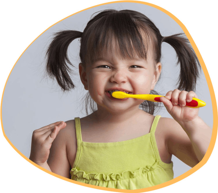Young girl happily brushing her teeth - Contact Bunny Kids Dental in Santa Ana, CA for appointments